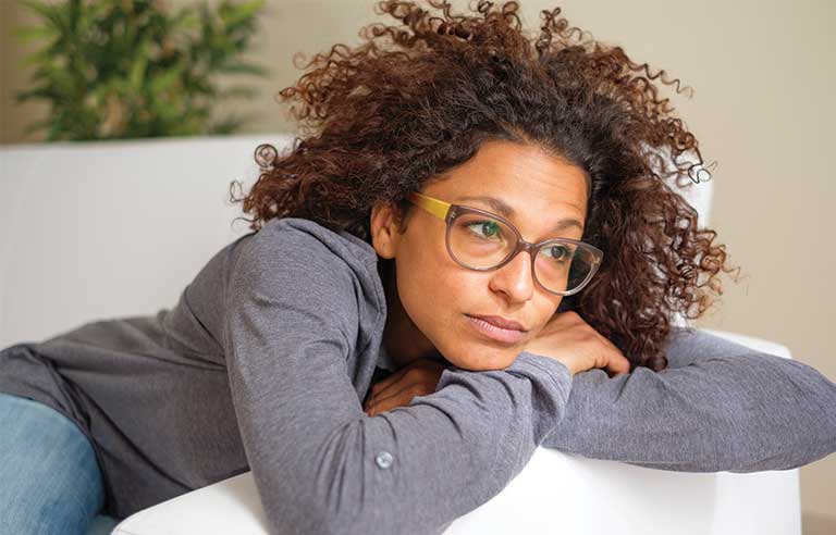 Tired Woman on couch